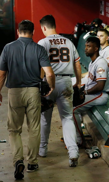 Posey leaves game inning after taking foul ball on mask